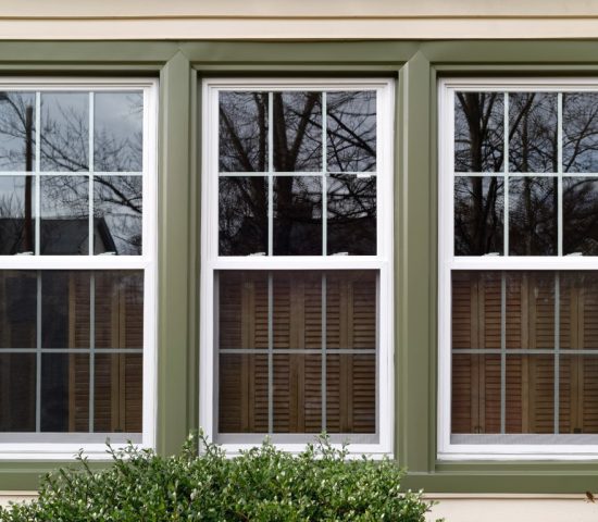 casement windows with green frame